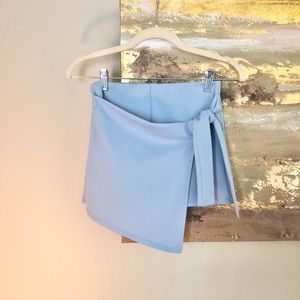 Skort with detailed tie in the front